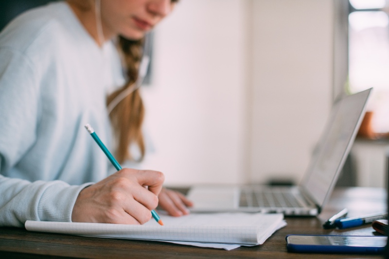 woman studying on computer