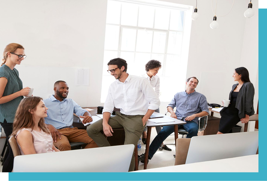 group of people hanging out and talking in an office