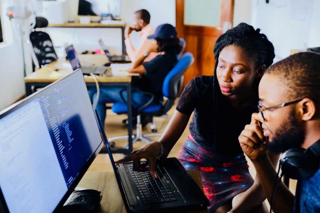 employees working together at a computer