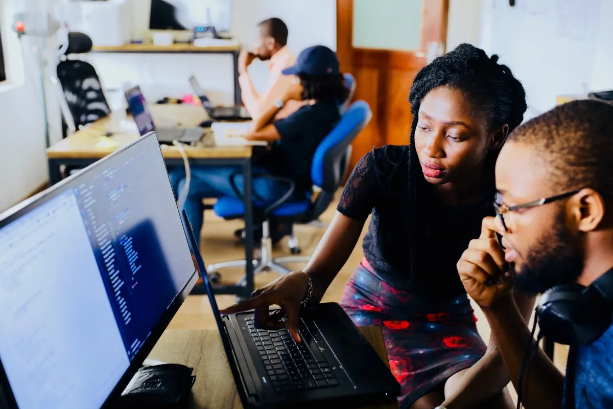 employees working together at a computer