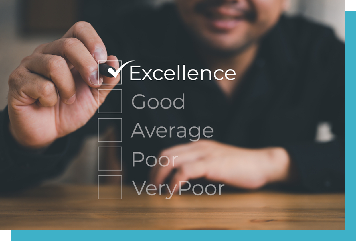 A hand checks a box labeled "Excellence" on a transparent rating scale, with options "Good," "Average," "Poor," and "Very Poor" in a blurred indoor setting.